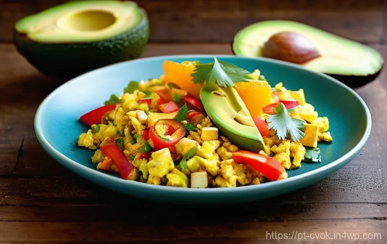 대체 단백질 요리법으로 만드는 아침식사 아이디어 - **Vibrant Tofu Scramble Breakfast:** A close-up shot of a steaming, golden-yellow tofu scramble, ric...